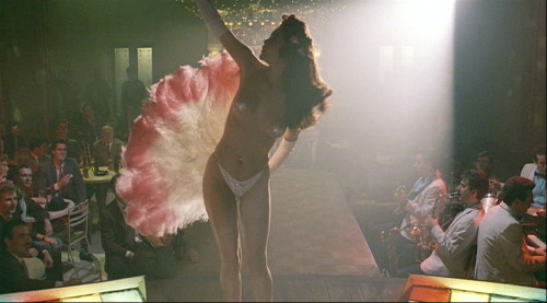 Playing stripper “Lorry Dane” in the underrated 1987 film: “THE BIG TOWN”,– actress Diane Lane performs a very tantalizing fan dance sequence.. Featured as a fellow stripper in the film, is an actress billed as: Lolita David.