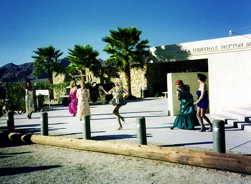  A 68-year old Dixie Evans (wearing “short gold”) kicks up her heels with other retired dancers, during Veterans Day celebrations at the ‘General Patton Memorial Museum’; at Chiriaco Summit, California.. Dixie sent me this photo back in November