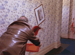 the-overlook-hotel:  Fake blood is splashed on the walls of the