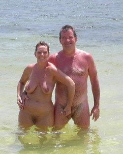  This nudist woman is keeping hold of her man ! 