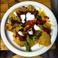 Single serve nachos with veggie crumbles and veggie cheese..