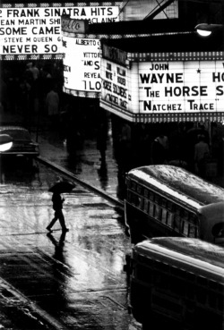 cruello:  Pedestrian in rain on 42nd street, nyc, usa, 1964 