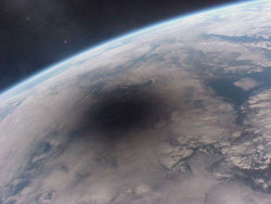 n-a-s-a:  Looking Back at an Eclipsed Earth  Credit: Mir 27 Crew;