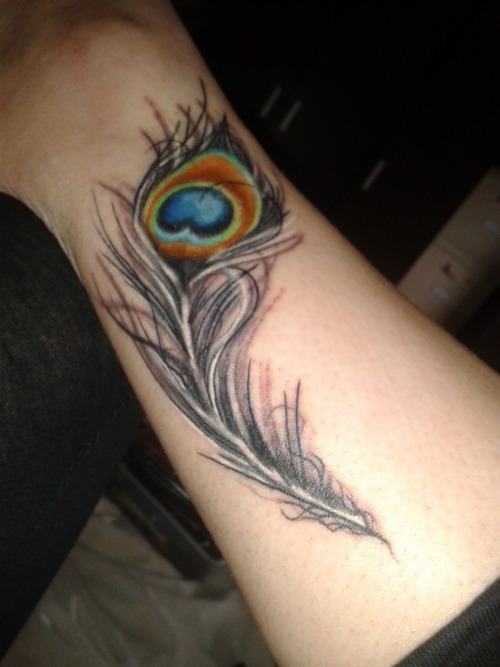fuckyeahtattoos:  This is my first tattoo which I got done at Southmead tattoo studio. Peacock feathers symbolise pride and this tattoo shows that I am finally proud of who I am. 
