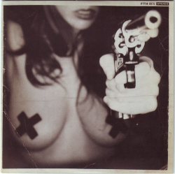 einsteinsface:  A girl. Her gun. Her tits.