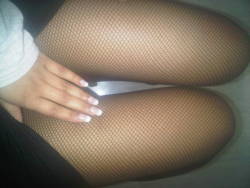 carmenbunnyx:  peek a boo i wear fishnets to school….i know right! 