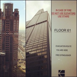 Looking out the window on the 61st flr. Looking up from the sub