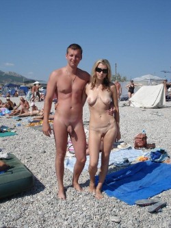 nudistlifestyle:  Nudist couple pose for a photo at the beach !
