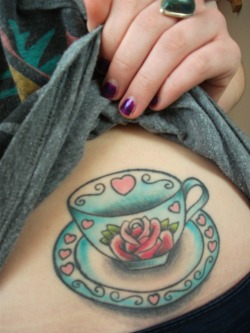 fuckyeahtattoos:  This is my first tattoo; it doesn’t have a great deal of meaning apart from that I love tea and one day hope to own and run a tea shop!  I love it! Done by Isra at Ultimate Skin tattoo in Leeds, UK. 