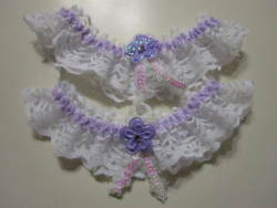 drug-child:  Lavender garter now available! http://www.etsy.com/listing/99065486/white-lace-garters-with-lavender-ribbon?ref=cat_gallery_3