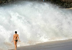 bikini girl: waves crashing on the beach…