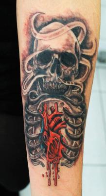fuckyeahtattoos:  my 4th tattoo on my forearm. bleeding heart skull! :)