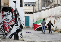 thepalestineyoudontknow:   Children carry a hand-made kite painted