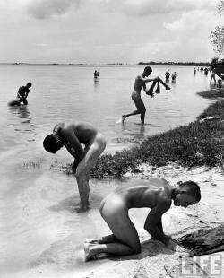 Vintage photo of nude soldiers bathing