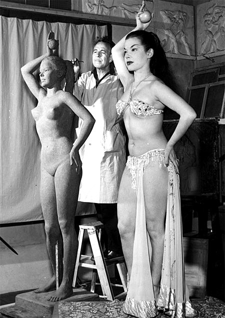 In November of ‘54, Nejla Ates poses for N.Y. sculptor Albino Manca.. Famed Broadway publicist David Merrick commissioned the life-size statue, and placed it in a well-travelled section of Central Park; as a well-crafted publicity stunt designed