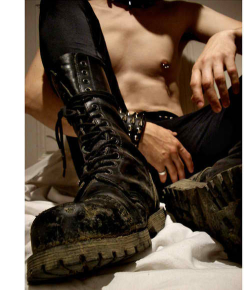 bootedskn:  k9dogslave:  Get those boots clean, dog!  SIR yes