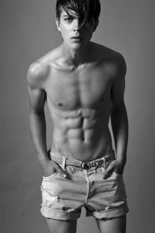 jacques-yvan:  strangeforeignbeauty:  Pedro Bertolini [ b&w ]  Quite a rebellious boy, He has no skivies under his cutoffs, I guess