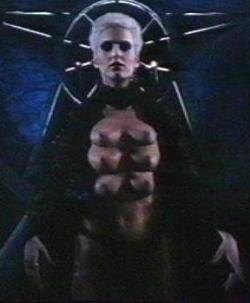 Leeanne Baker in Necropolis, 1987. You can order the six-breasted