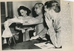 burlyqnell:  A press photo from March of &lsquo;49 features Evelyn West in an Oklahoma City courtroom.. She had been charged with indecency and exhibition. A lawyer displays her net bra, as a point of evidence..