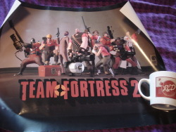 cklikestogame:  SMALL TEAM FORTRESS 2 GIVE AWAY!With Meet the Pyro tomorrow, I figured why not let you TF2’ers have something.The poster has some wear on it due to staples in the corners but other than that it looks pretty fine to me. The mug on the