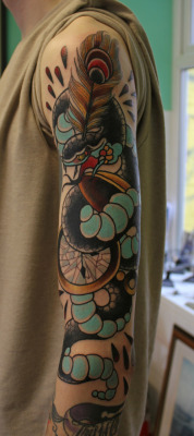 dermagraphique:  Here’s a cool arm piece. I love the style