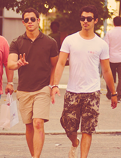 jonasbro:  Nick Jonas and Joe Jonas walking in Soho, New York