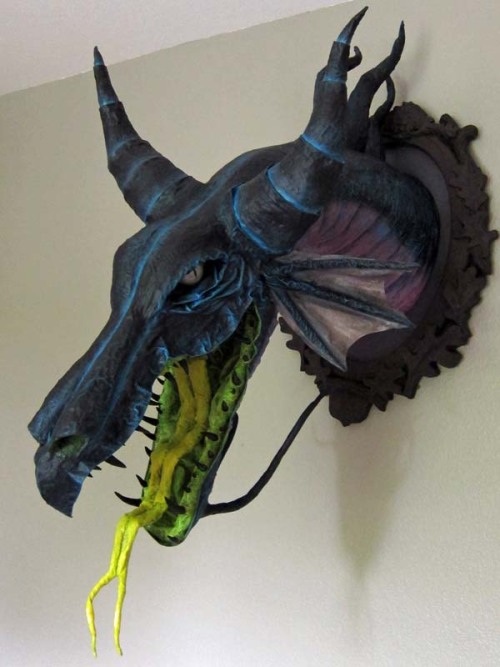 gothambeat:  Paper Mache “Maleficent” Dragon Trophy This is way too cool. More on it here.   PAPER FUCKING MACHE ……FUCK 