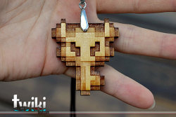 ianbrooks:  Pixelated Wooden Keyrings by Patricia Temblay / TwikiConcept Available at etsy. Hi-res is just a phase but pixels will last forever… as long as you’ve got an extra Continue. Patricia’s laser cut wooden keyrings and pendants let you