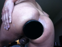 inkedfister:  Stretching my hole with a 10.75” wide butt plug.