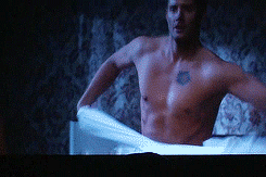 bonersoups:  Jensen trying to seductively take off his shirt: