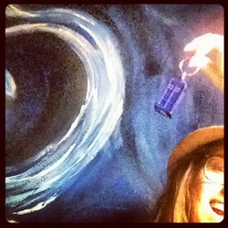 There was a starry night mural in the restaurant &amp; I made my TARDIS keychain fly through it. (Taken with Instagram)