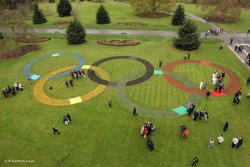 olympics:  Olympic officials and the media admire a large set