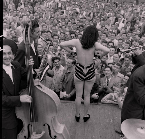 heart-shaped-apple: On March 4th - 1948, popular New Orleans stripper Stormy (aka. Stacey Lawrence) was invited by the Student Council of LSU, to perform on their campus (with a live Jazz band accompaniment!).. A raucous mob quickly formed. Only half