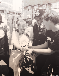 rupelover:  Rupert Grint carries the Olympic Torch and signs