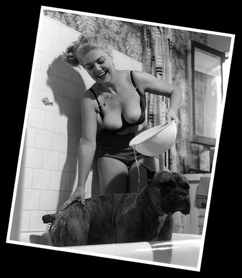 Jennie Lee gives her pet dog (“Duke”) a bath during this Nudie-Cutie photoshoot intended for “The Bazoomers”  fan club..