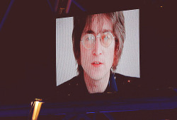 ghoddos:  John Lennon is displayed on a screen inside the stadium