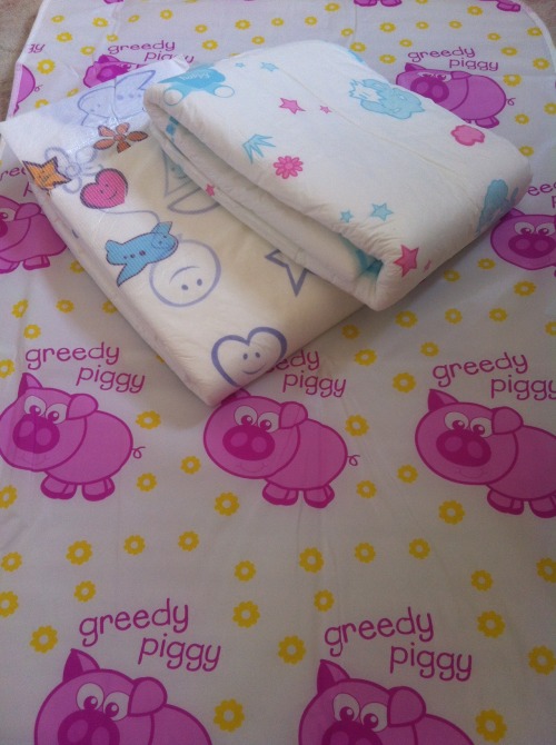 liddlebird:  My greeeeedy piggies changing mat, my new cushies & fabines. Little me is sorted.Â  