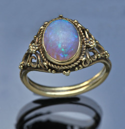 violetholiday:  neon-vagina:  Edward Spencer Gold Opal Ring British