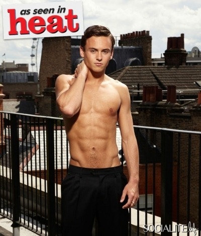 socialitelife:  Yowza! Hello Tom Daley! The 2012 London Olympic bronze medalist posted for a revealing spread in Heat magazine. Tom was thankfully shirtless in most of the pics, but donned black pants and some Clark Kent glasses for a more studious