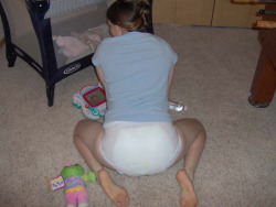 nappyboyryan:  Something about this pic I just love! Definitely amateur, so sheâ€™s either playing with a childâ€™s toys or sheâ€™s into it herself ;)!Â  