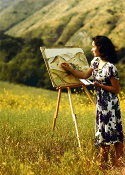 marthaivers:  Elizabeth Taylor painting on a hill, June 1947