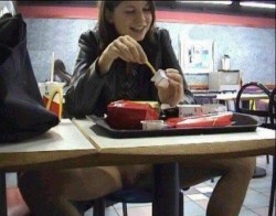 fastfoodflashers:  Cute girl flashing her shaved pussy at McDonald’s