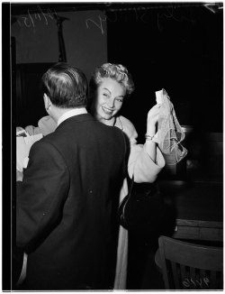sunsetgun:   G-string for Victory!!  Lili St. Cyr celebrates with her attorney Jerry Giesler, after being acquitted of all charges related to her “immoral, obscene and indecent..” behavior, during an October &lsquo;51 performance at L.A.&rsquo;s