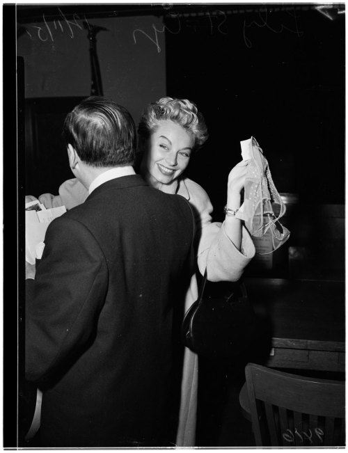 sunsetgun:   G-string for Victory!!  Lili St. Cyr celebrates with her attorney Jerry Giesler, after being acquitted of all charges related to her “immoral, obscene and indecent..” behavior, during an October ‘51 performance at L.A.’s