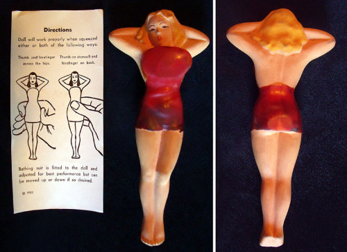 Vintage Burlesque “BUBBLES” novelty toy.. Produced in 1952, this rubber latex Showgirl features a modest bustline that jumps beyond a DD-cup, when the toy is squeezed properly.. An accompanying Instruction leaflet adds: “the Bathing Suit is