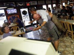 keepcalmandbespooky:  Obama getting a bear hug from a Republican