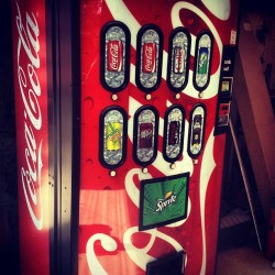 We ballin’ at the shop now ha brand new coke machine (Taken