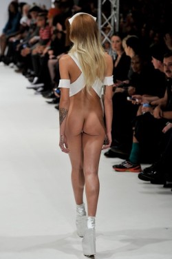  Alice Dellal strutting down the catwalk showing off her beautiful