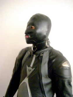spunkybox:  Rubber mask and dainese T-age suit. 