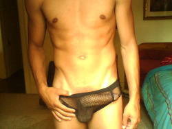 randy9bis:  Smooth boi, and sexy fishnet briefs in which to show